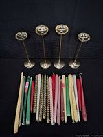 Candlesticks and candles grouped together