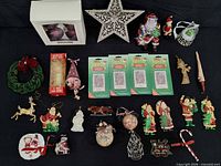 full layout of assorted ornaments on black background