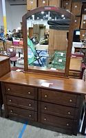 Front view of dresser with mirror showing drawers and hardware