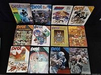 All twelve Pro! NFL program magazines laid out front covers visible
