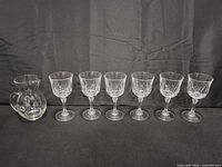 All items line-up: six goblets and pitcher