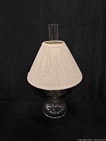 Lamp with shade assembled