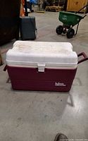 Closed Igloo maroon and white cooler showing exterior and logo