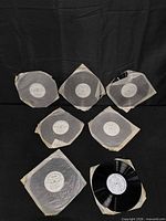 Seven Learn A Language vinyl records in sleeves spread out