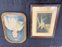 Front view of both framed prints showing artwork and frame styles