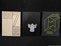 Group shot of three Loyola College yearbooks showing covers and titles