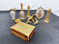 Group shot showing all nine vintage decorative items
