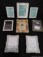 All eight picture frames arranged showing variety and sizes