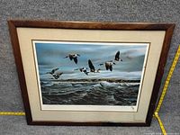 Front view of framed print showing artwork, mat and frame