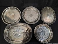 All five silver plated platters