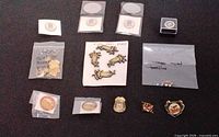 Overview of all bags, cards and loose pins