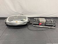 Grill and knife sharpener side by side