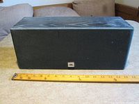 Front view of JBL center speaker with ruler indicating length