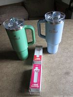 Pair of Cirkul mugs and boxed flavor inserts