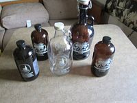 Five growlers grouped on tabletop