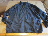 Full view of CQR Liberator jacket laid flat showing size and overall condition