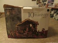 Front of Holiday Time box showing branding and set title