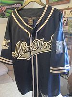 Front view showing New York script and sleeve graphics