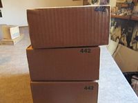 Three brown Princess House cartons stacked, each printed 442