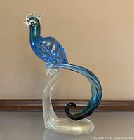 Full view of Murano glass peacock figurine on base