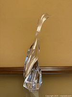 Front angled view of clear crystal heron sculpture