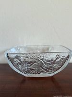 Full side view of square crystal bowl showing Art Nouveau lady relief