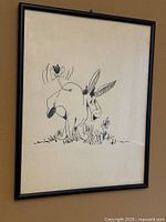 Full view of framed Eeyore illustration on wall