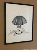 Full view of framed illustration on wall