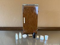 Front view of refrigerator with all accessories lined up