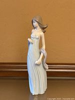 Full view of figurine front and side