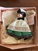 Doll in original box with tissue wrap