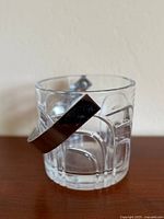 Front view of crystal ice bucket showing Maestro cut pattern and handle