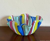 Top view of multicolour ruffled glass bowl