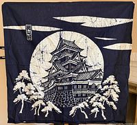 Full view of indigo furoshiki showing castle scene