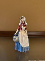 Front view of Royal Doulton Jersey Milkmaid figurine