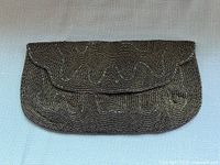 Front view of beaded clutch showing wave pattern