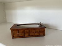 Side and top view of wooden miniature bathtub