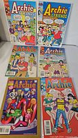Six Archie and Archie & Friends comics bagged and boarded