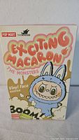 Front of sealed Pop Mart The Monsters Exciting Macaron box