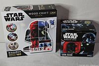 Puzzle and coin bank boxes front view