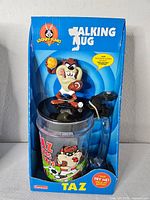 Front view of sealed Taz Talking Mug packaging