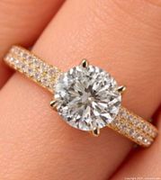 Top view of ring showing lab diamond centre and CZ pave band