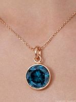 Pendant on chain showing size and color