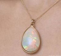 Pendant on chain showing size and colour play of opal