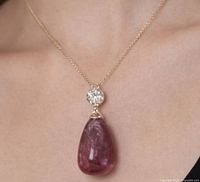 Pendant worn on model showing size and drop