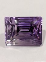 Front view of rectangular step-cut amethyst