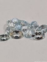 Group of loose faceted aquamarine stones