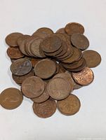 Pile of approximately 50 Canadian pennies