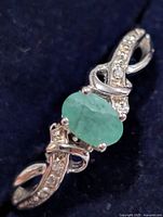 Front view showing emerald and CZ design