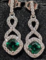 Front view of both earrings showing stone setting and design